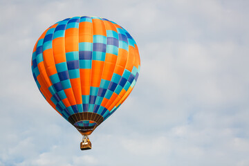 hot air balloon over blue sky. Composition of nature and blue sky background