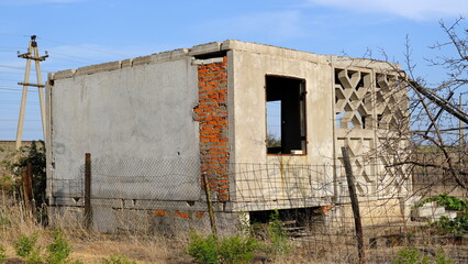 Fototapeta na wymiar Abandoned houses on personal plots in Russia.