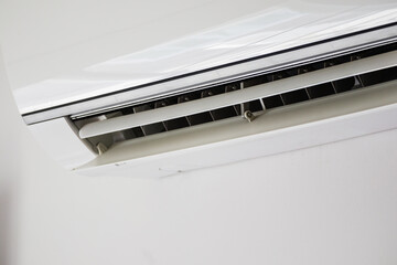 Close up air conditioner on white wall background