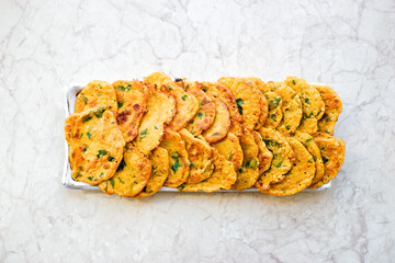 homemade healthy indian style chickpea pancakes with different spices and herbs Delicious vegan food 