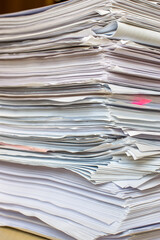 bundles bales of paper documents. stacks packs pile on the desk in the office