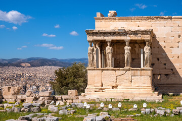 Panoramic view of Erechtheion or Erechtheum - temple of Athena and Poseidon - within ancient Athenian Acropolis complex atop Acropolis hill in Athens, Greece