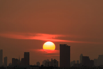 Fototapeta na wymiar Sunset with cityscape of building silhouette,At twilight in Bangkok ,Thailand