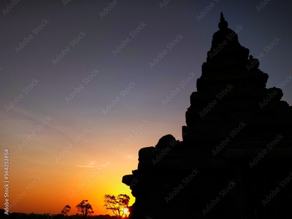 Wall mural silhouette temple sunset