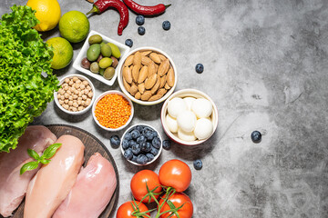 Fresh balanced food on the table top view. Food delivery concept.