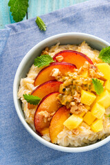 Sweet and Healthy Porridge with Fresh Fruits. Diet Breafast Idea