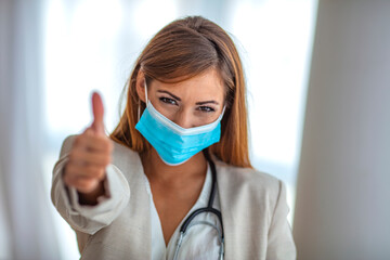 Beautiful caucasian young woman with disposable face mask. Protection versus viruses and infection....