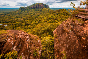 Background of wooden walkways (wooden bridges) created for high-angle views on mountains, natural attractions, or parks that have forest preservation