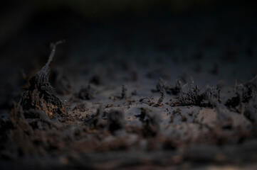 background texture of the inner wall of the oven covered with a large layer of black soot