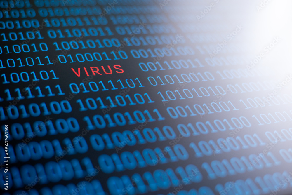 Fototapete the word virus, written in red letters on a background of binary code in blue; white light on the ri