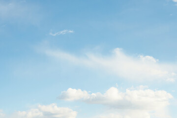 Blue sky and white clouds. Sunny day.