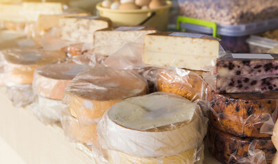 Homemade cheese at the farmers market. Local organic food