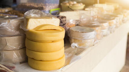 Homemade cheese at the farmers market. Local organic food