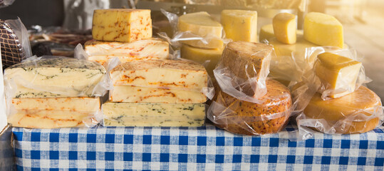 Homemade cheese at the farmers market. Local organic food