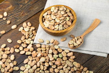 broad beans on a wooden background
