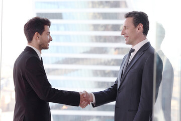 Business people shaking hands