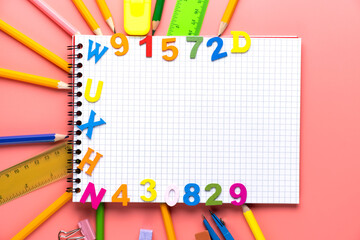 Many different school supplies on white copy space background. Back to school concept.