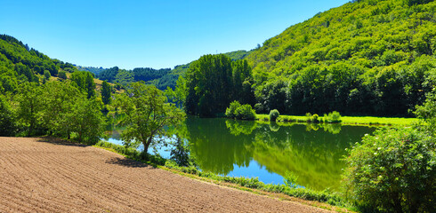 beautiful river with forest, vallee of Lot  in France