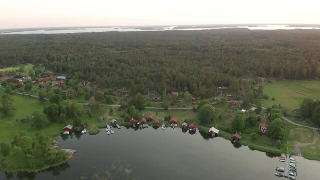 Aerial view of coastal village along shoreline in the Swedish archipelago