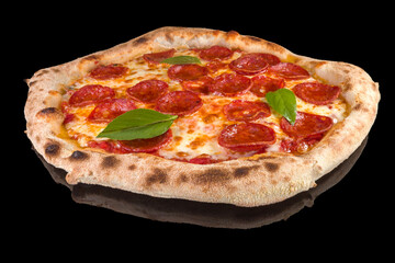 Tasty pizza pepperoni with tomato sauce, mozzarella, salamela calabro Picante and fresh basil with reflection, isolated on black background