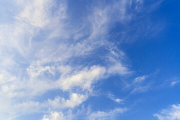 Obraz premium White clouds in beautiful deep blue sky background. Environmental and space exploration concept .