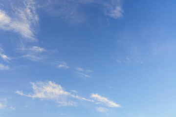 beautiful evening summer sky with white rare clouds, copy space for text.