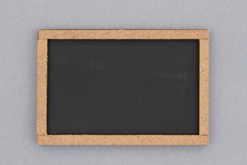 Blank grunge chalkboard sign with wood frame