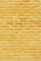 background of wide Brick wall detail texture, vertical image.