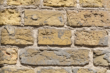 yellow brick wall. background of an old brick house