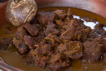 daging rendang or rendang beef or semur daging. traditional indonesian food from padang, west...