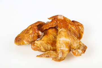 Smoked chicken wings over white background