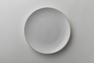 Top view shot of white circular plate.