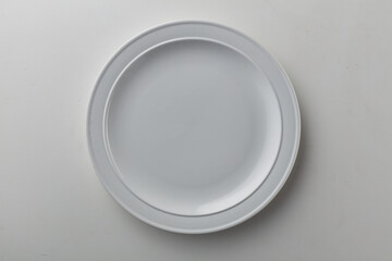 Top view shot of white circular plate.