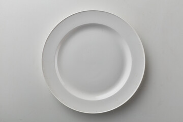 Top view shot of white circular plate.