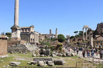 In the ancient city of Rome stands the temple of Saturn.