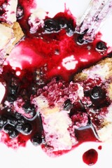 Delicious vanilla cheesecake with blueberry sauce macro