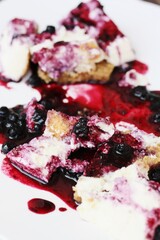 Delicious vanilla cheesecake with blueberry sauce macro