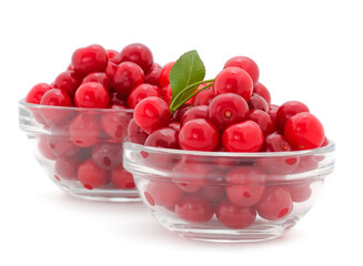 Fresh cherry fruits in a glass bowl.