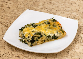 Slice of Ossetian pie with cheese and herbs