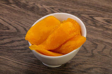 Sweet mango slices in syrop