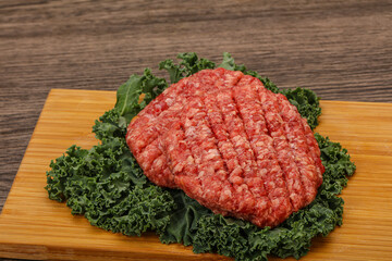 Raw beef burger cutlet for cooking