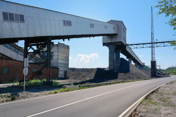 Coal mining and storage. Close-up of coal industry objects.