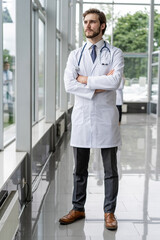 happy male medical doctor portrait in hospital.