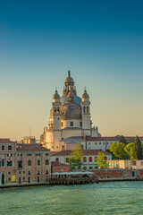 Fototapeta na wymiar Basilica di Santa Maria della Salute at beautiful calm sunset, Venice, Italy