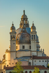 Fototapeta na wymiar Basilica di Santa Maria della Salute at beautiful calm sunset, Venice, Italy