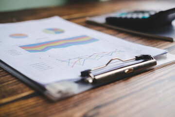 Calculators and graphs for business reports.