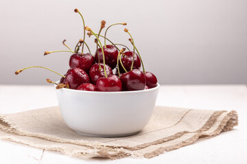 bowl of sweet cherries on a napkin