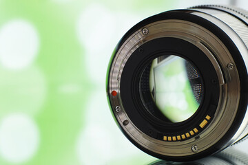 Equipment videographer and photographer. Lenses on the table against the background of bright...