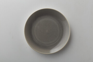 Top view shot of a plate on white background.