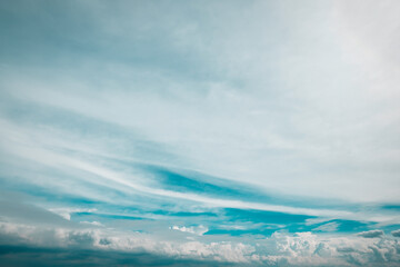 blue sky and white cloud background like a wave in the sea